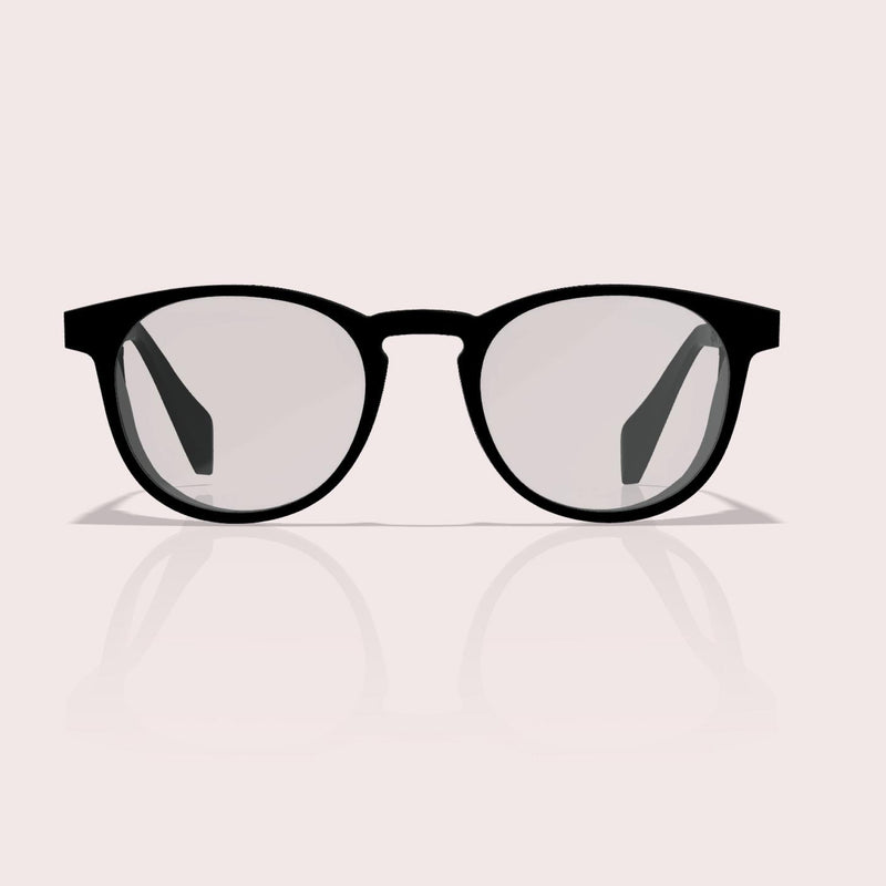 GOGHINI Focus Frames™ shown from direct front view, displaying black round frames that appear as regular eyewear from this angle, with the peripheral blocking shields hidden from frontal perspective
