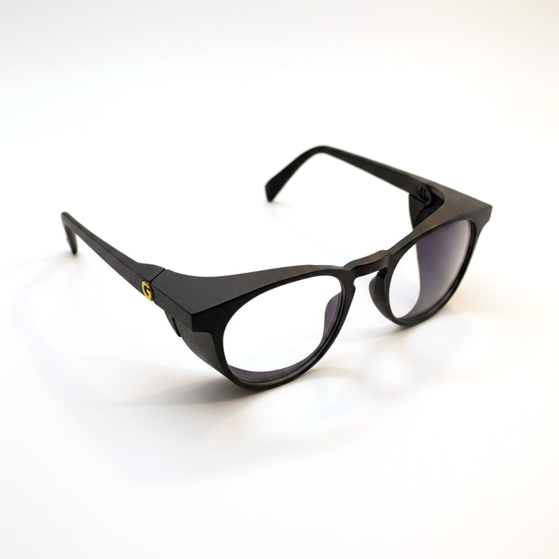 GOGHINI Focus Frames™ three-quarter view showing the integrated side shield, fin join and gold G badge near the hinge