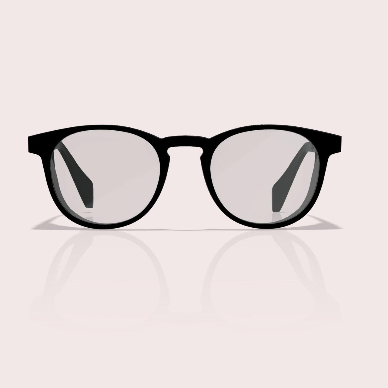 GOGHINI Focus Frames™ shown from direct front view, displaying black round frames that appear as regular eyewear from this angle, with the peripheral blocking shields hidden from frontal perspective