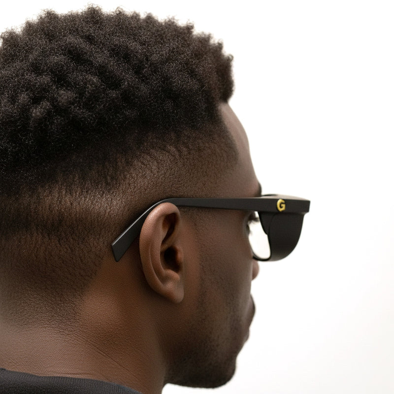 Man wearing GOGHINI Focus Frames™ seen from behind, showing the flat temple arm, side shield and gold G