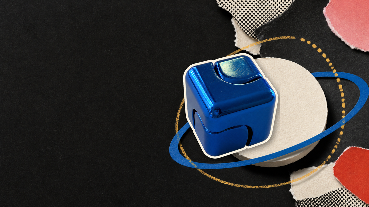 Tactile paper collage featuring a hand-free blue metal fidget cube cutout