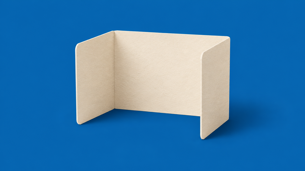 Cream paper desk screen with folded sides on a blue background